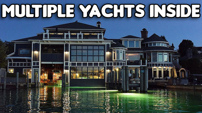 Dream Home is Built Around an Aquatic Garage for Multiple Yachts